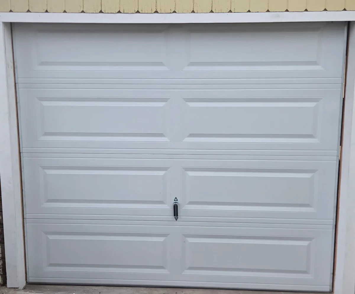 Community garage door after project proof for Valiant Garage Door